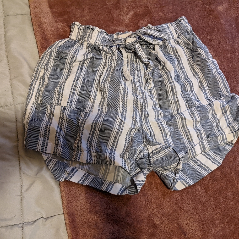 Size women's small. Flowy blue and white striped shorts. With pockets!